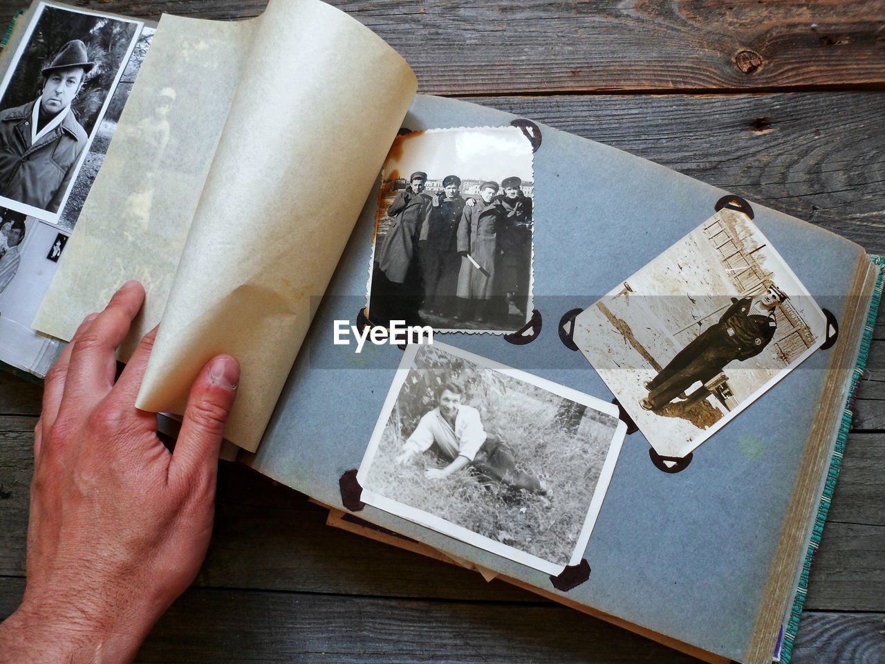 Old family album with old black and white photographs