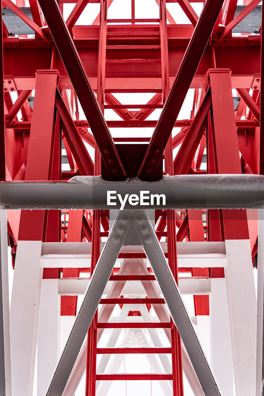 Pylon, red and white painted steel tower. the fragments showing the details of construction