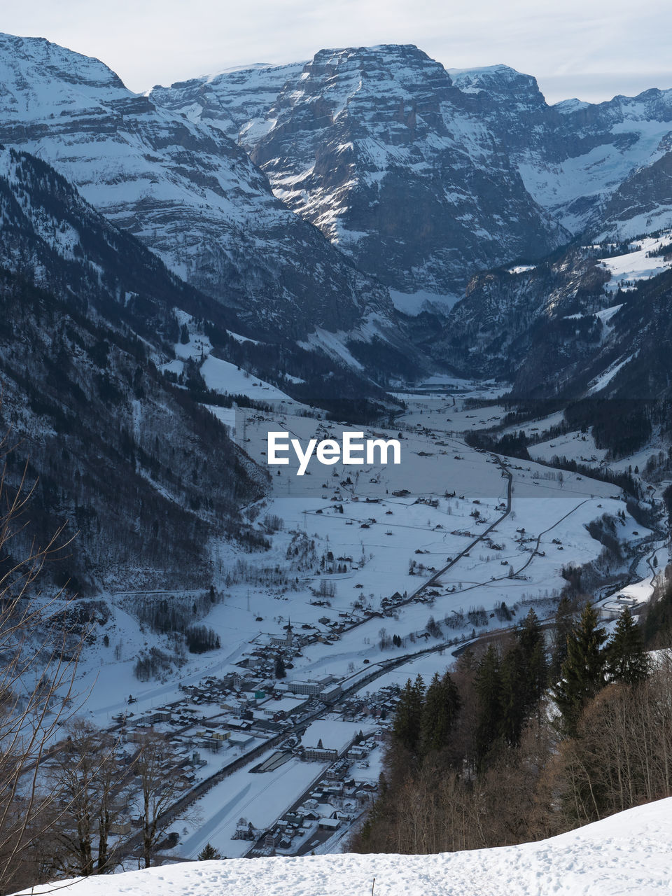 Scenic view of snow covered mountains