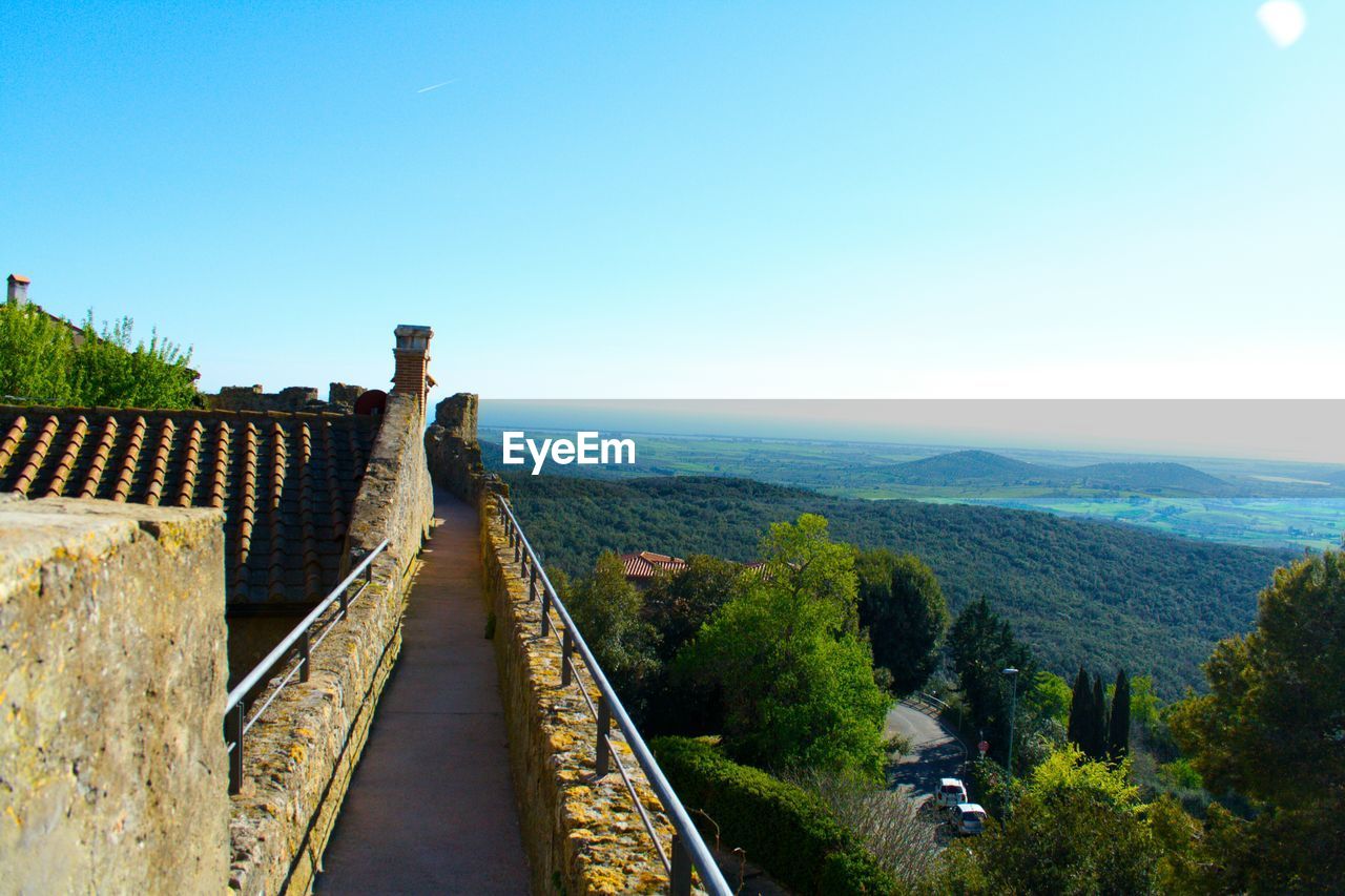 Panoramic shot of landscape against clear blue sky