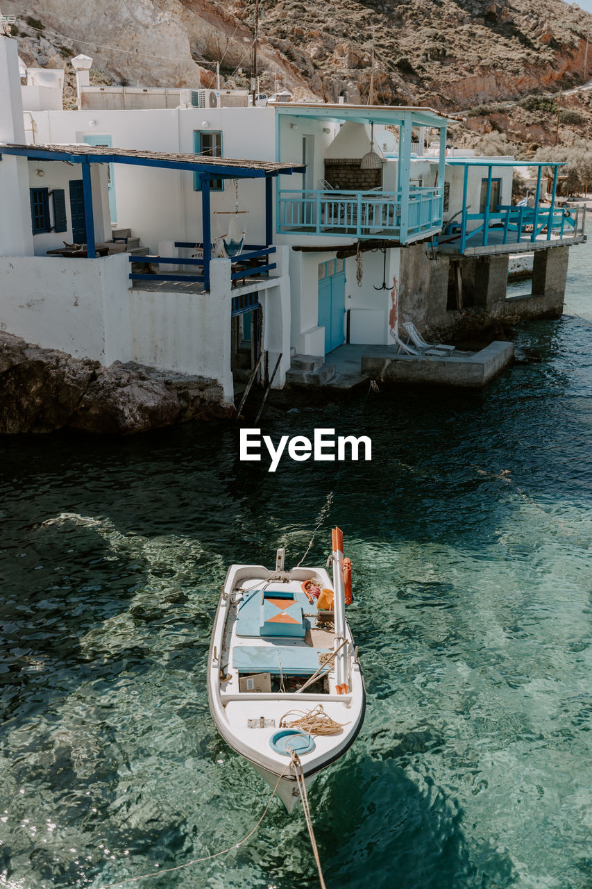 Boat moored at seashore