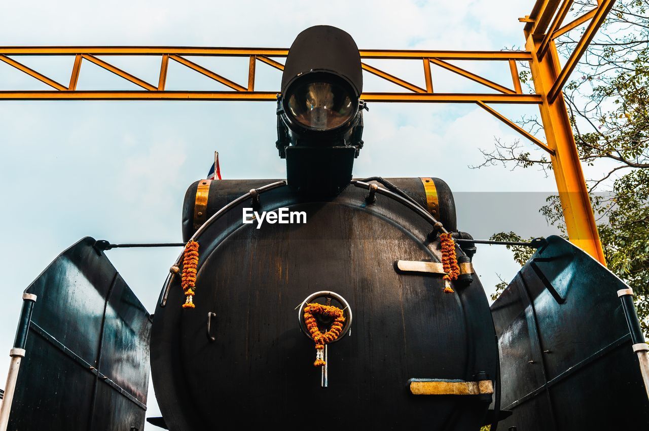 Low angle view of train against sky