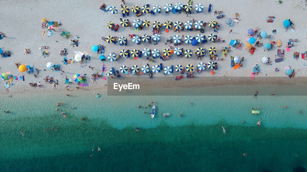 Drone view of people at beach