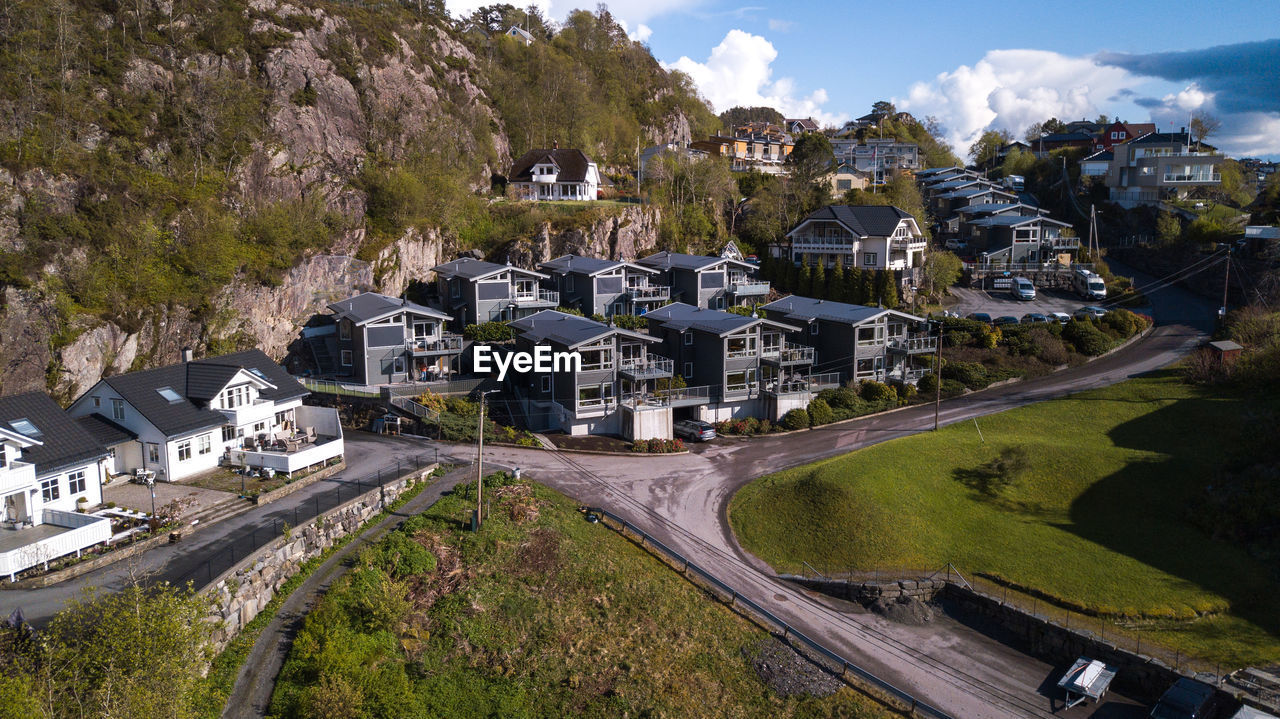 High angle view of street amidst buildings in city