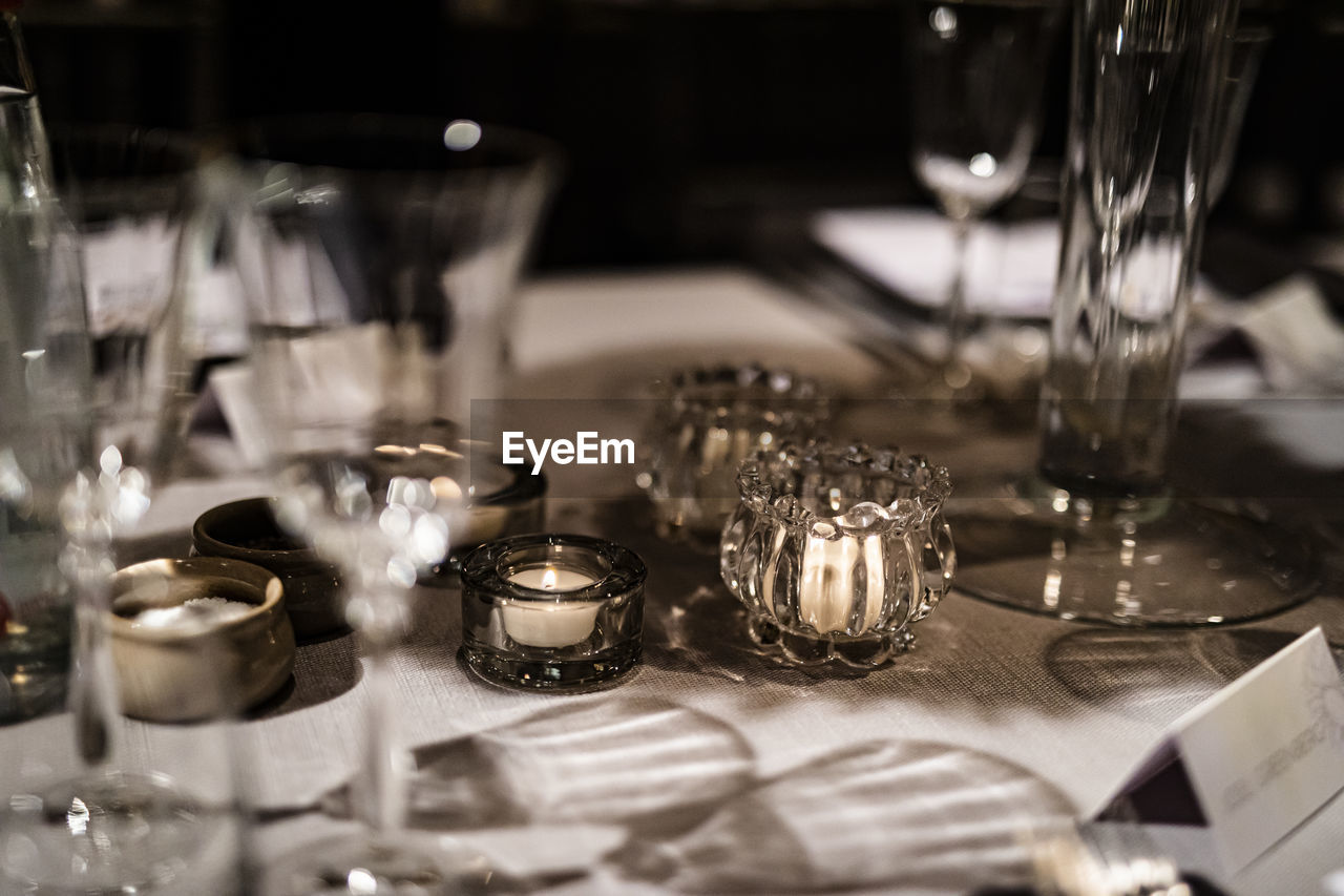 Close-up of glasses on table