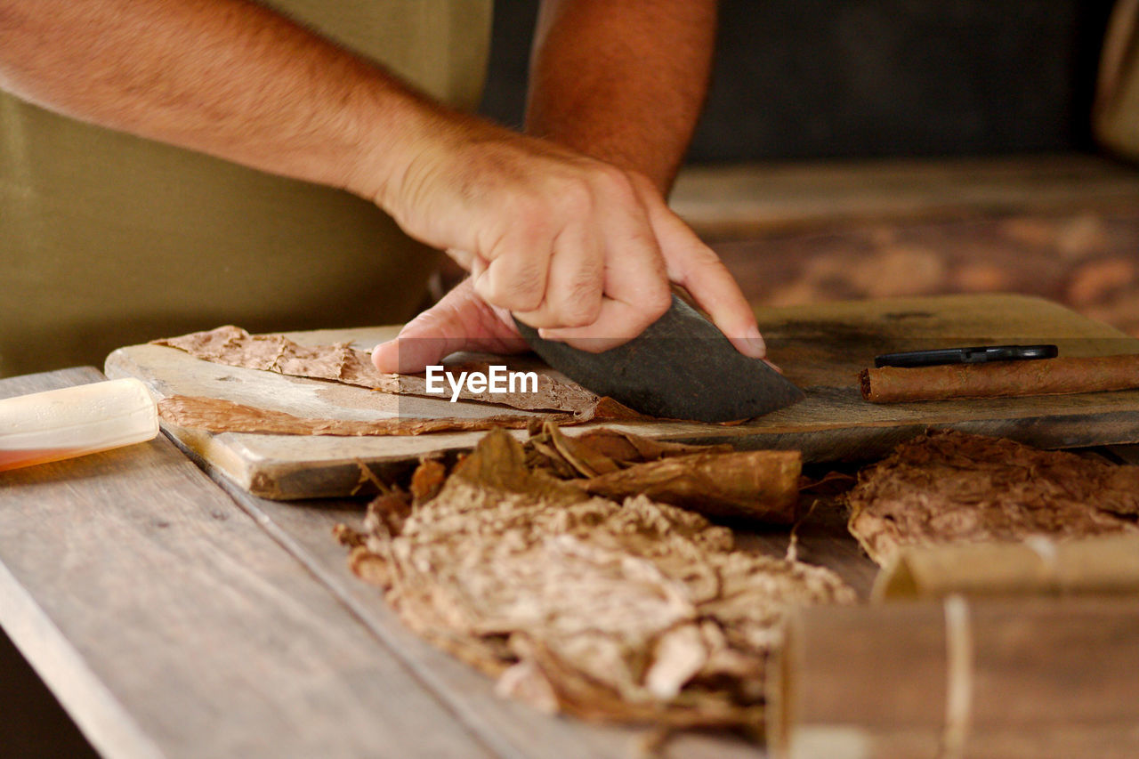 Making cuban cigars by hand in vinales, cuba.