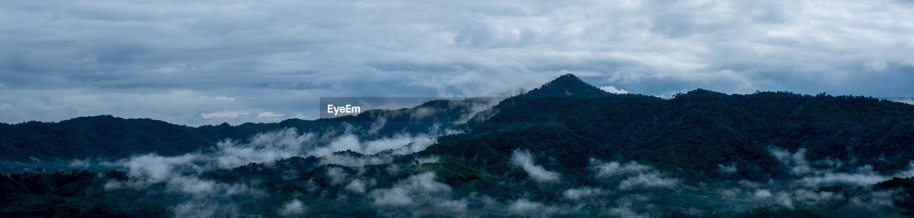 cloud, mountain, environment, sky, scenics - nature, landscape, nature, beauty in nature, mountain range, panoramic, land, tree, forest, plant, fog, mountain peak, no people, travel, travel destinations, outdoors, wilderness, tourism, tranquility, non-urban scene, ridge, pinaceae, cloudscape, dramatic sky, pine tree, tranquil scene, overcast