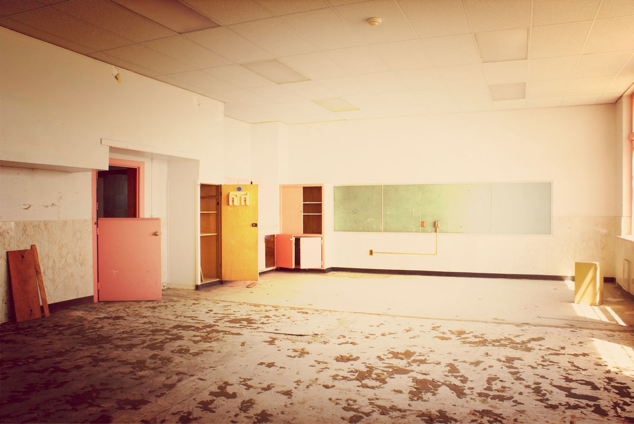 EMPTY CORRIDOR WITH BUILDING IN BACKGROUND