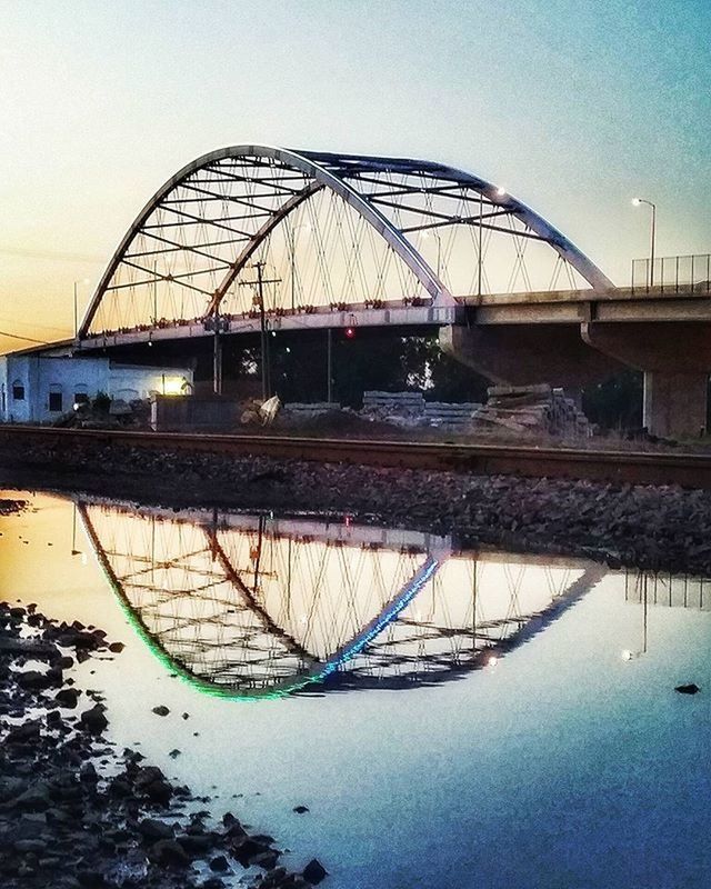 VIEW OF BUILT STRUCTURE BY RIVER