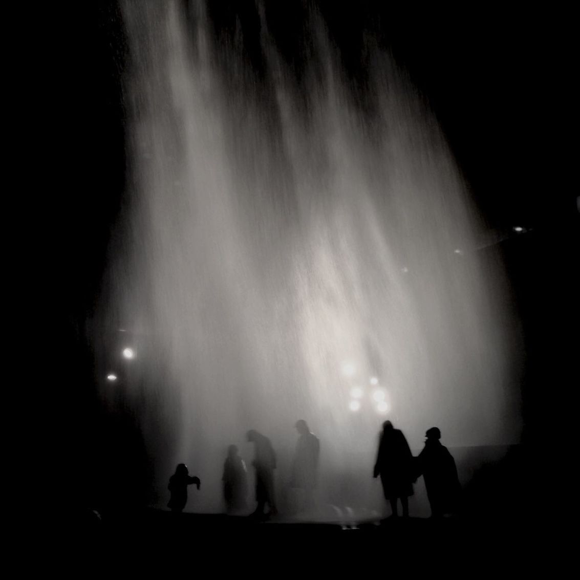 Silhouette people enjoying in instant structure for schacht xii at zollverein coal mine industrial complex