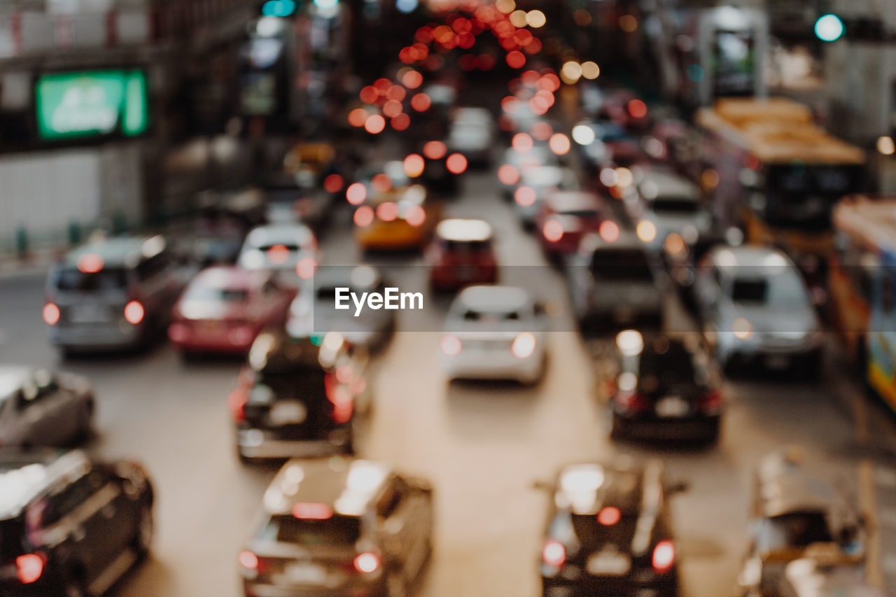 TRAFFIC ON ROAD IN CITY STREET