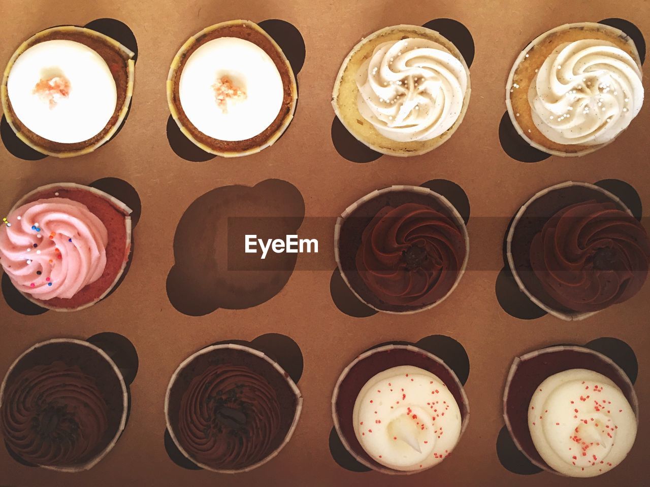 Close-up of cupcakes in cardboard container