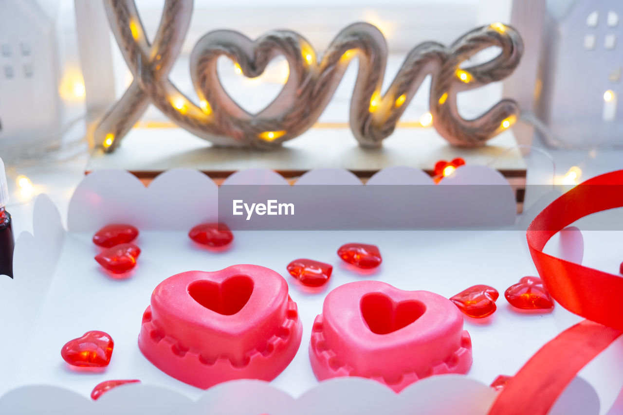 font, valentine's day, red, heart, heart shape, no people, love, positive emotion, celebration, emotion, event, petal, sweet, sweet food, indoors, food and drink