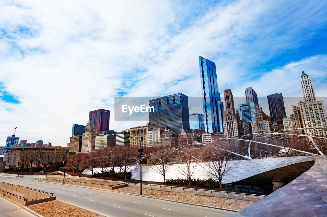 PANORAMIC VIEW OF BUILDINGS AGAINST SKY