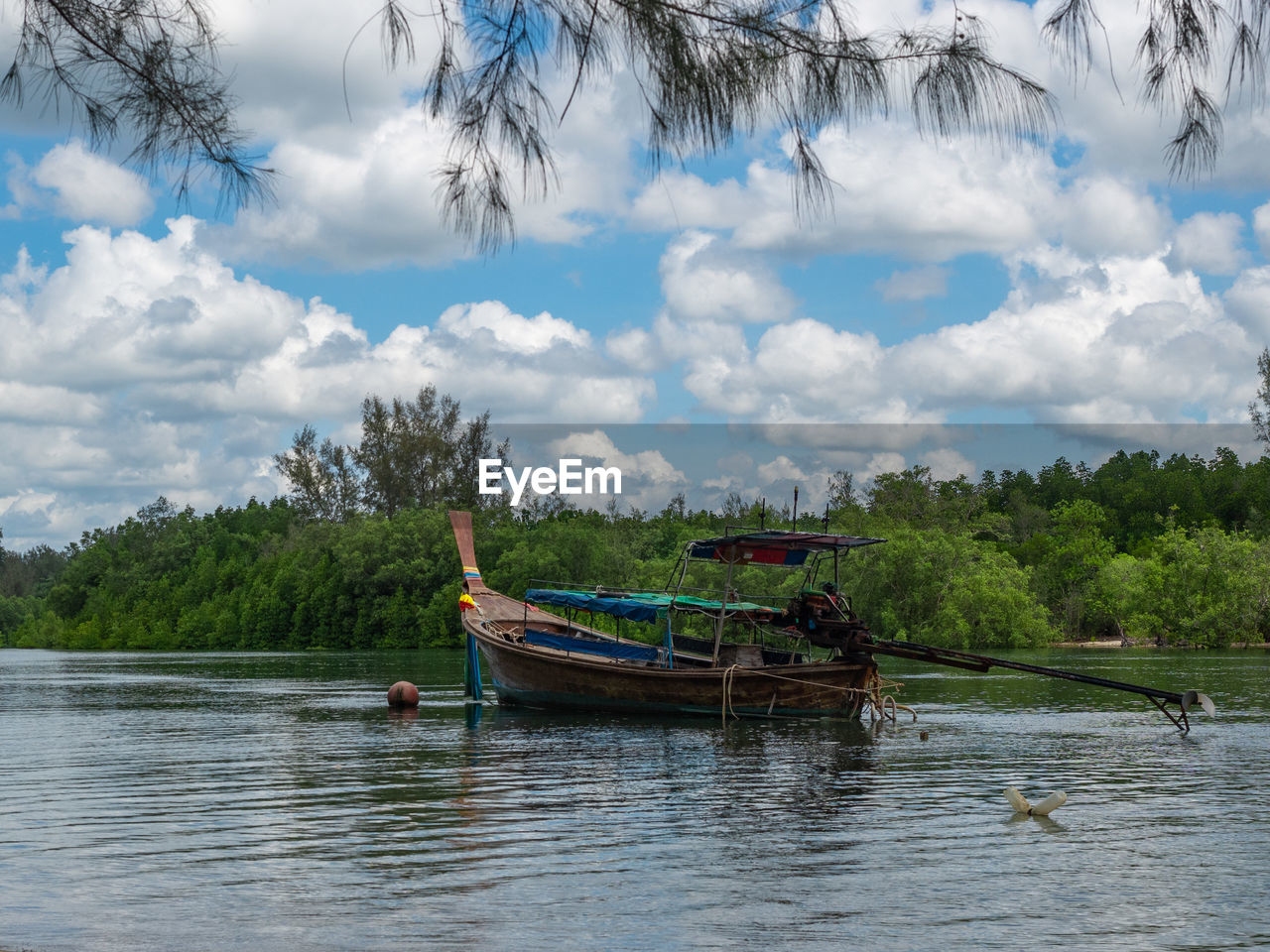 NAUTICAL VESSEL ON RIVER AGAINST SKY
