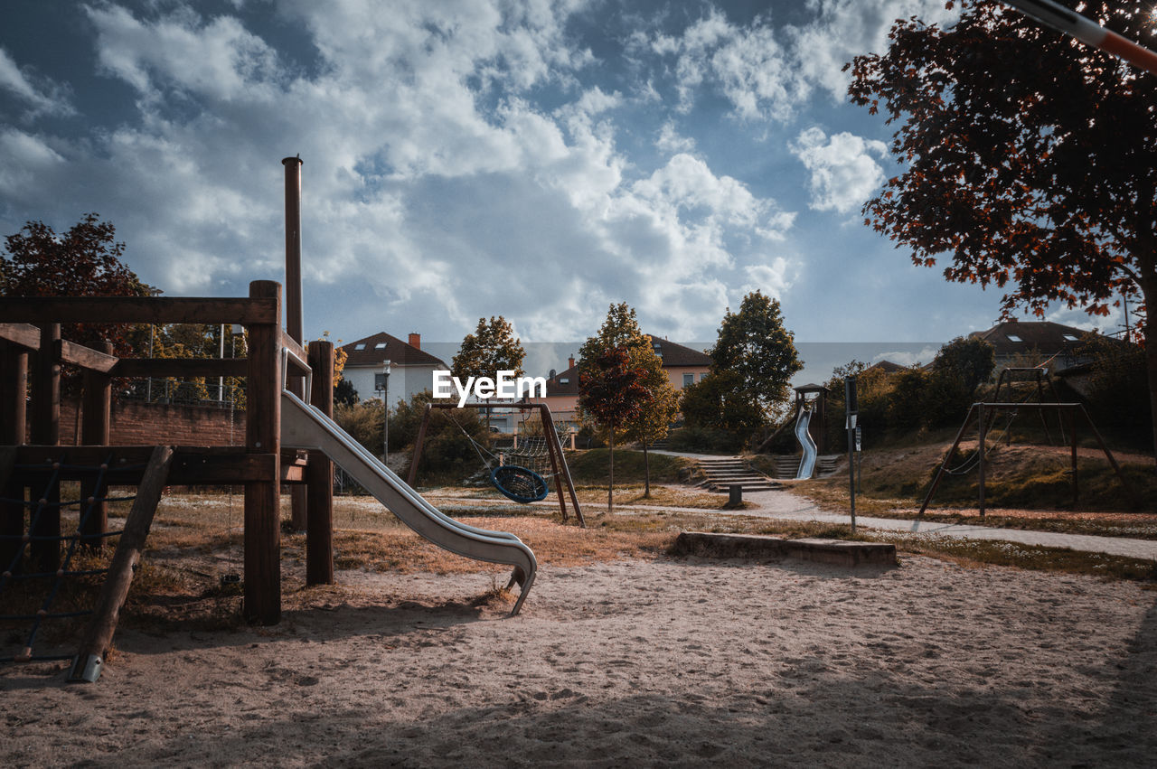 VIEW OF PLAYGROUND AGAINST SKY