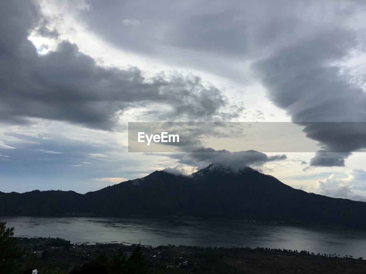 VIEW OF MOUNTAINS AGAINST CLOUDY SKY