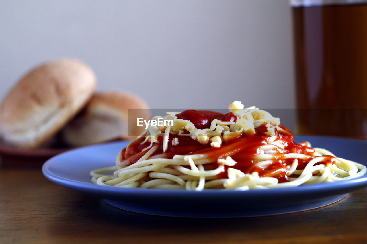 CLOSE-UP OF FOOD SERVED ON TABLE