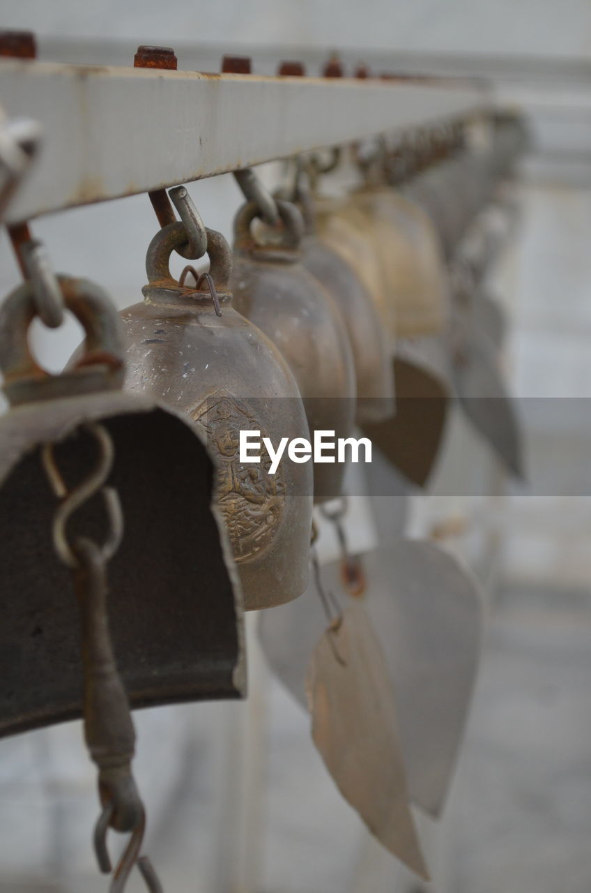 CLOSE-UP OF PADLOCK ON METAL