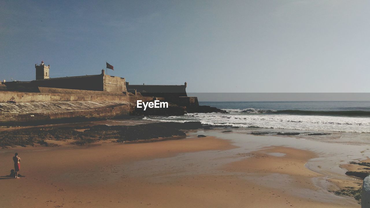 VIEW OF BEACH AGAINST SKY