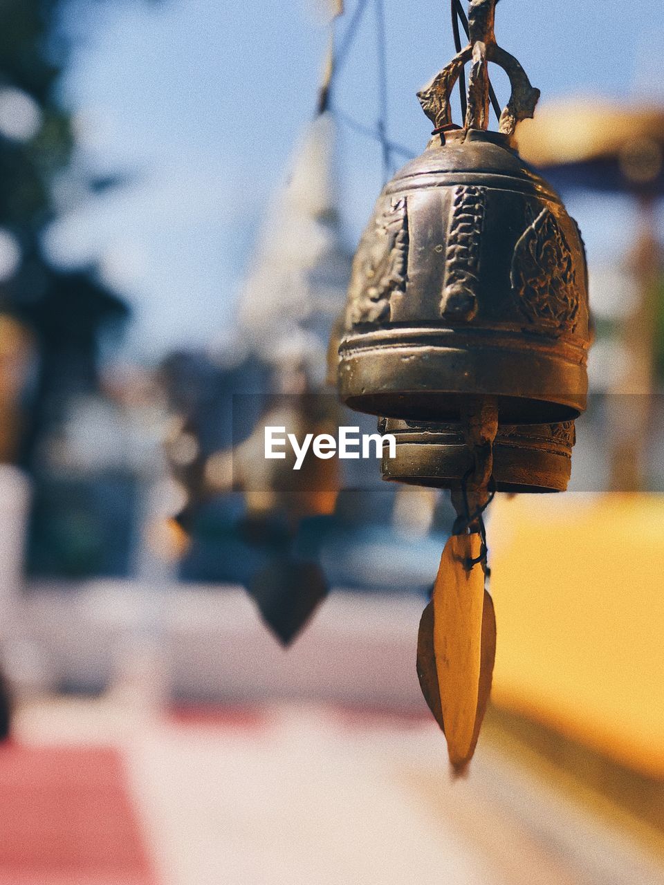 Close-up of bells hanging in temple