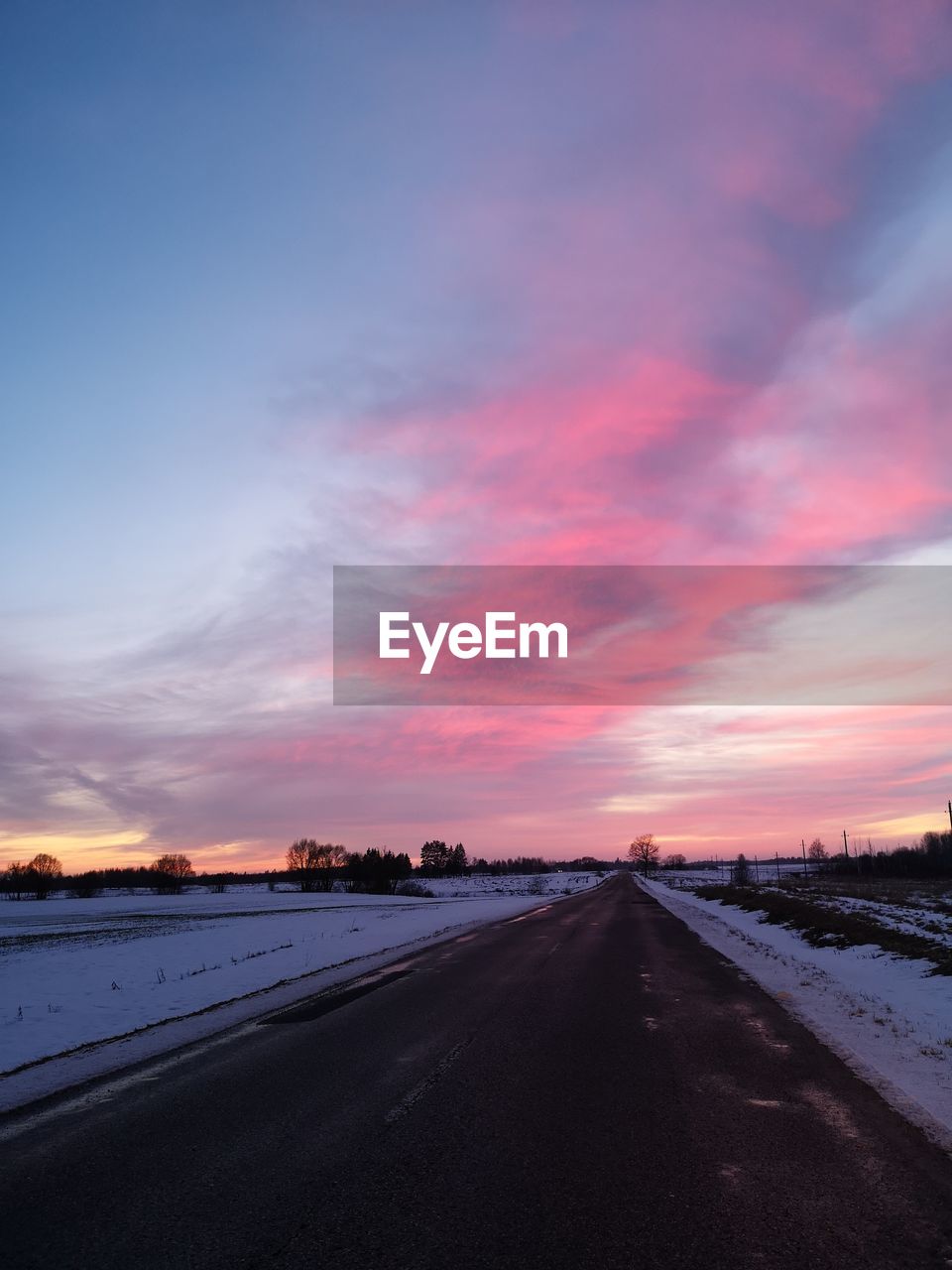 Road against sky during sunset