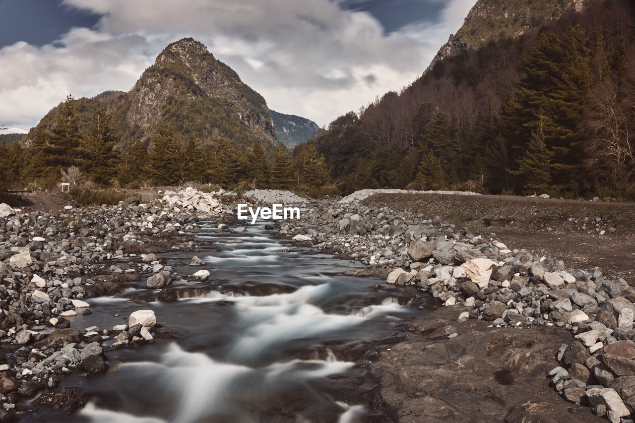 Scenic view of river stream against sky