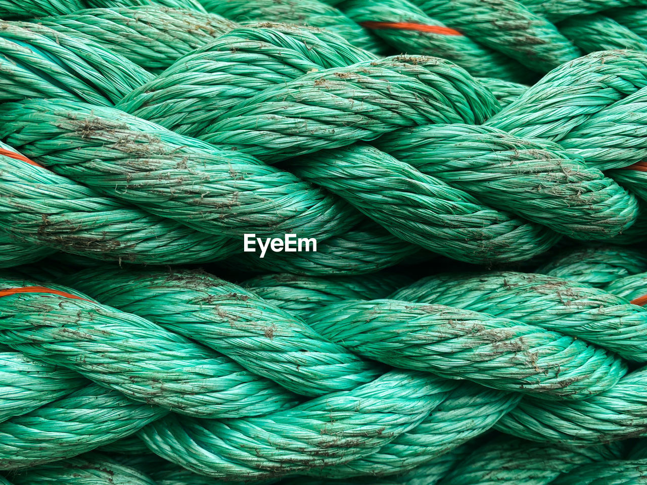 A green rope using at ship. close up. pattern