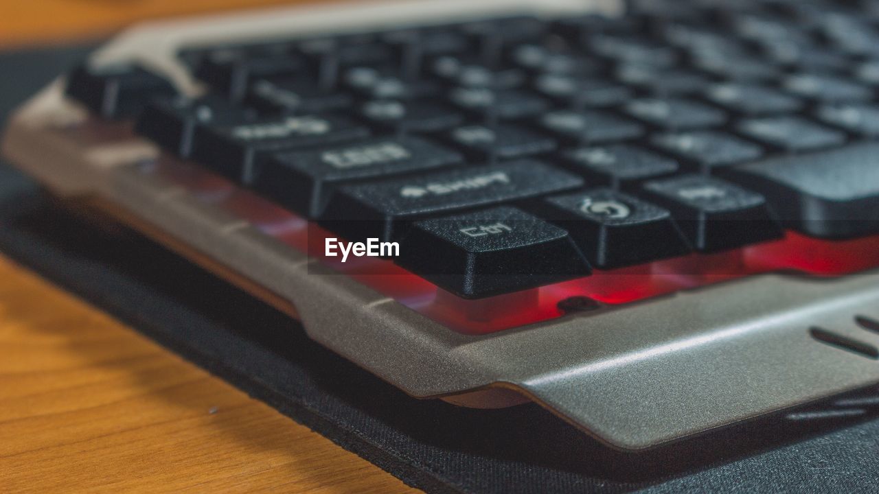 Close-up of computer keyboard on table