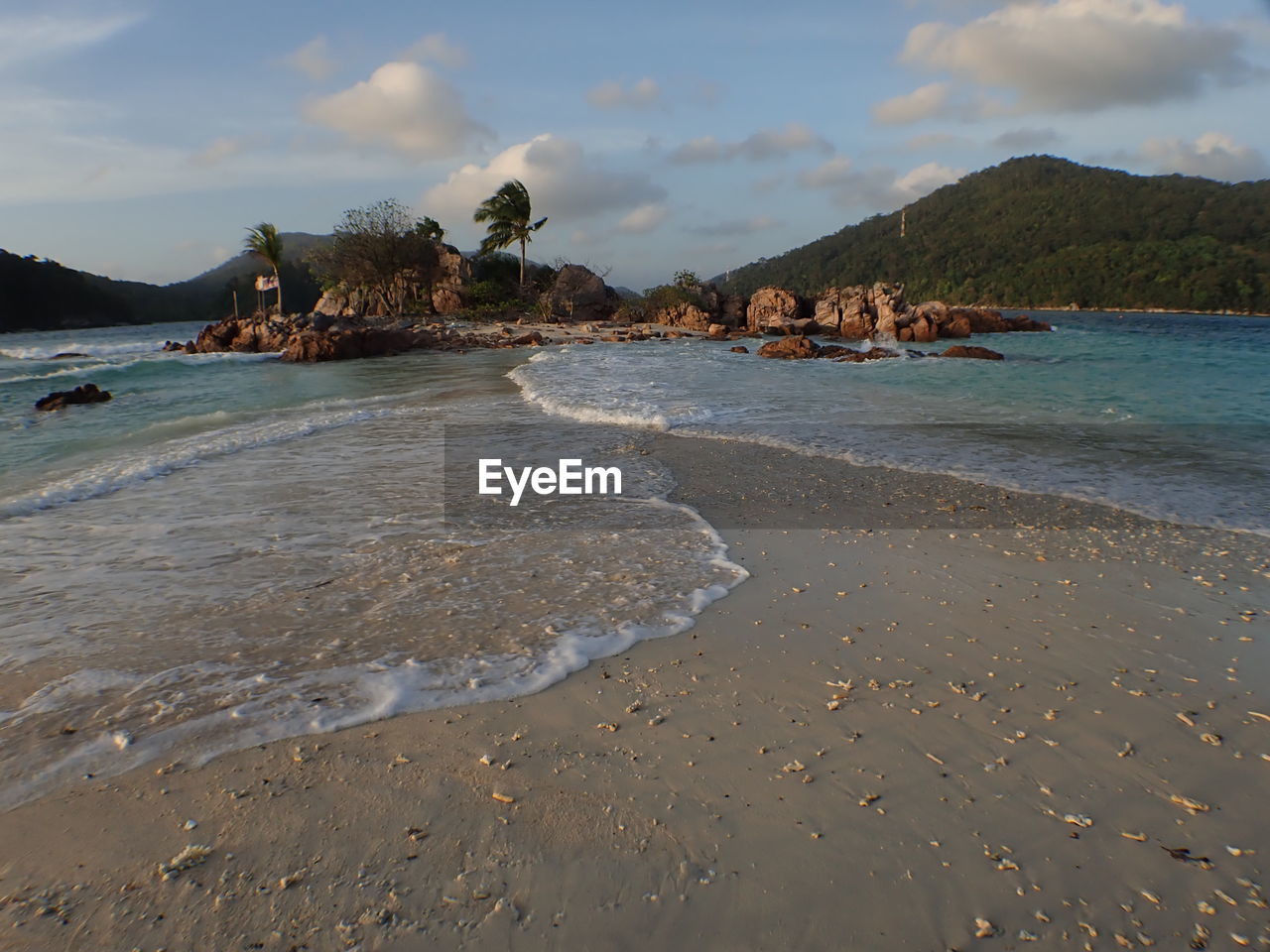 The scenery of beach with crystal blue water located at marine park redang, malaysia