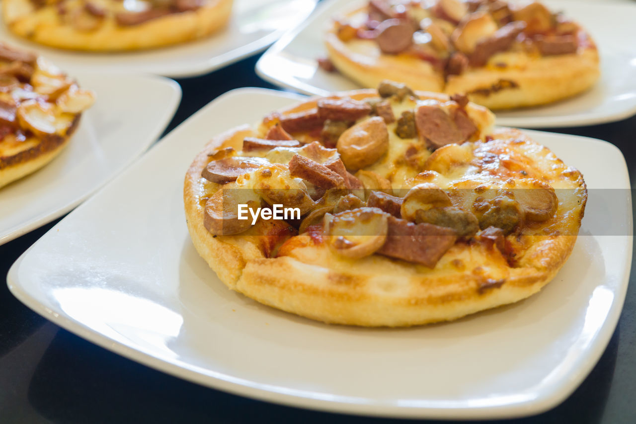 High angle view of pizza in plate on table