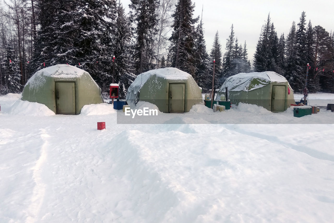 Inflatable rescue living tents in the snow. rescue housing modules for winter conditions.