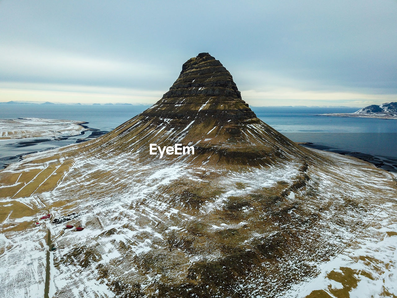 Scenic view of sea against sky during winter