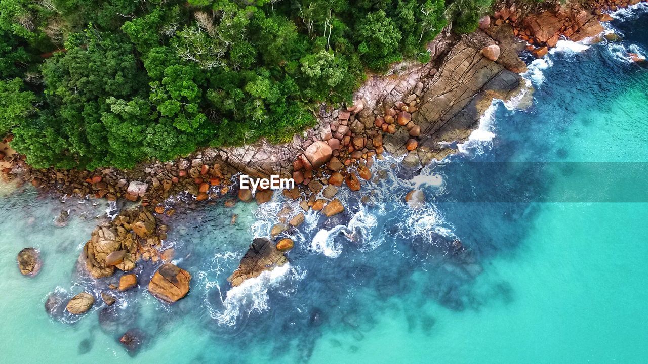 High angle view of stones on shore