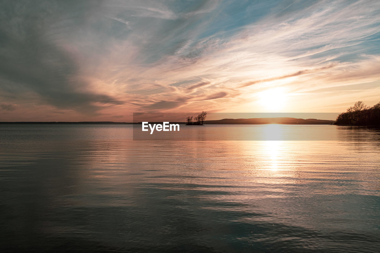 SCENIC VIEW OF SEA DURING SUNSET