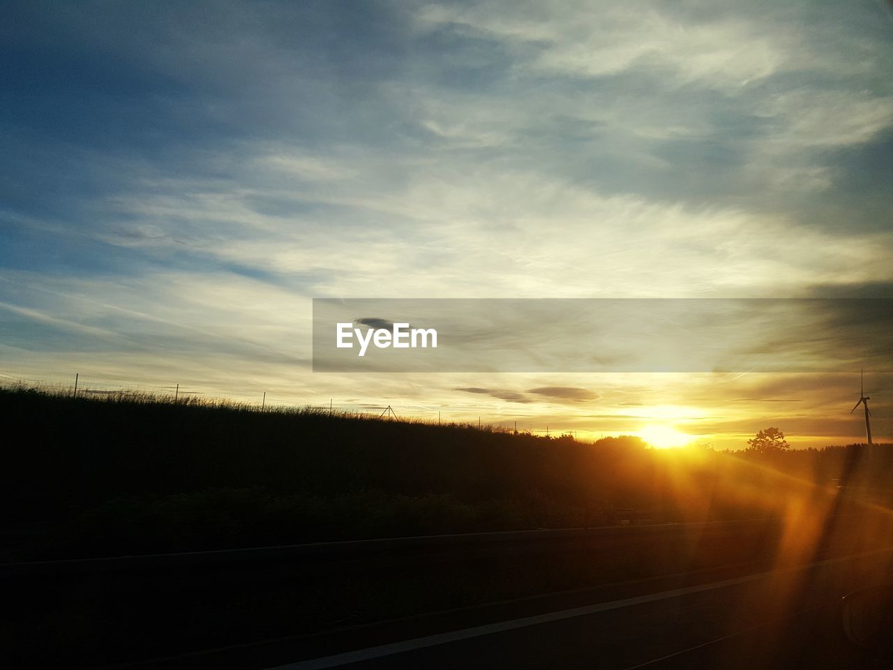 Scenic view of silhouette landscape against sky during sunset