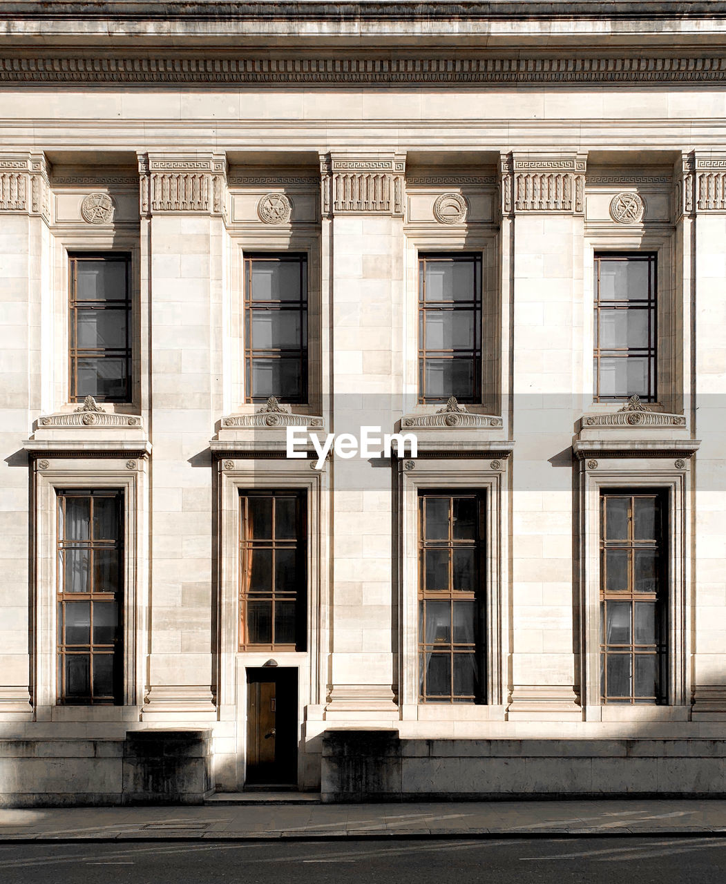 Full frame shot of building facade with shadows 