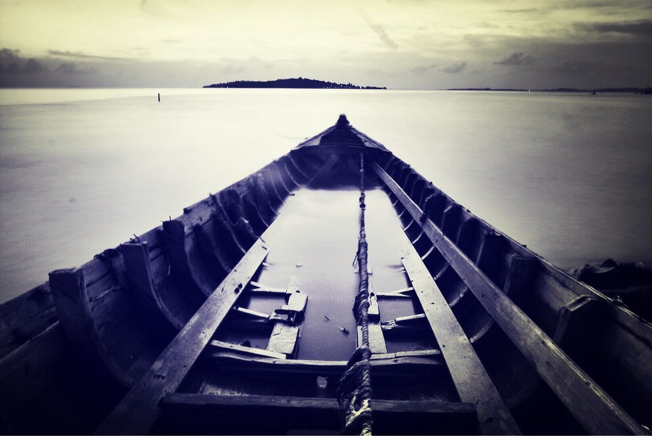 Close-up of boat with sky in background