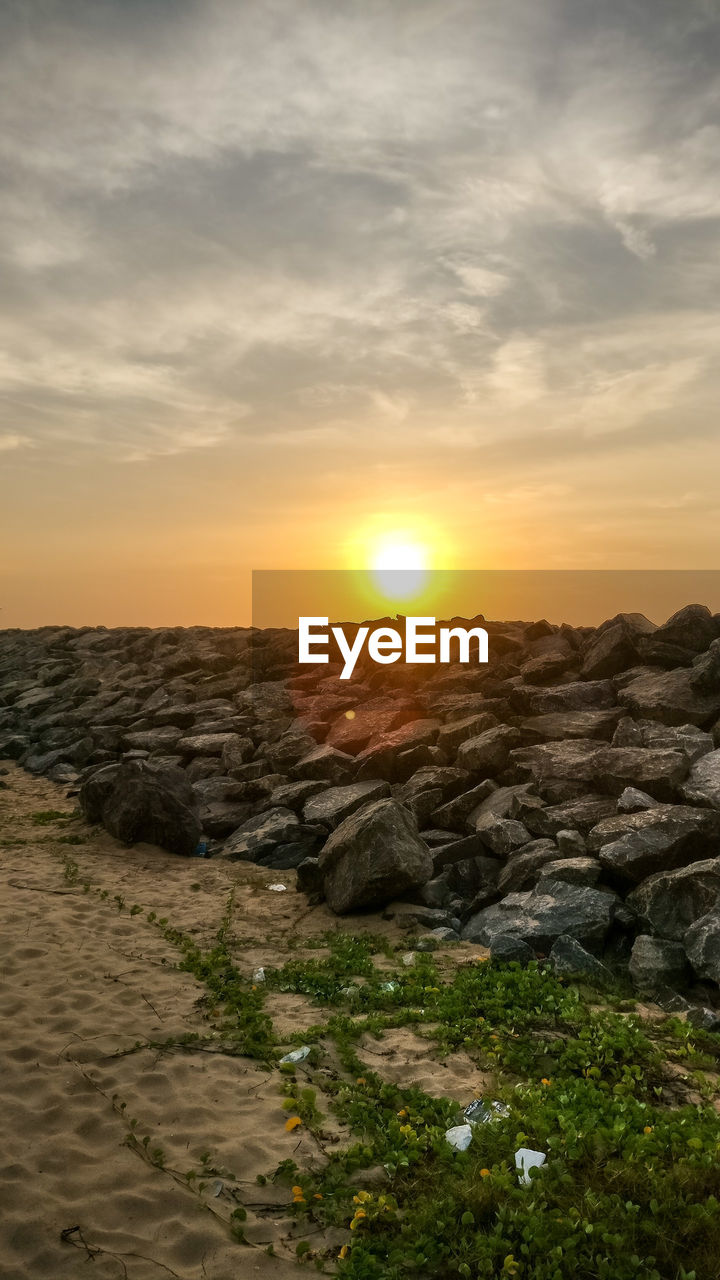 SCENIC VIEW OF SEA DURING SUNSET