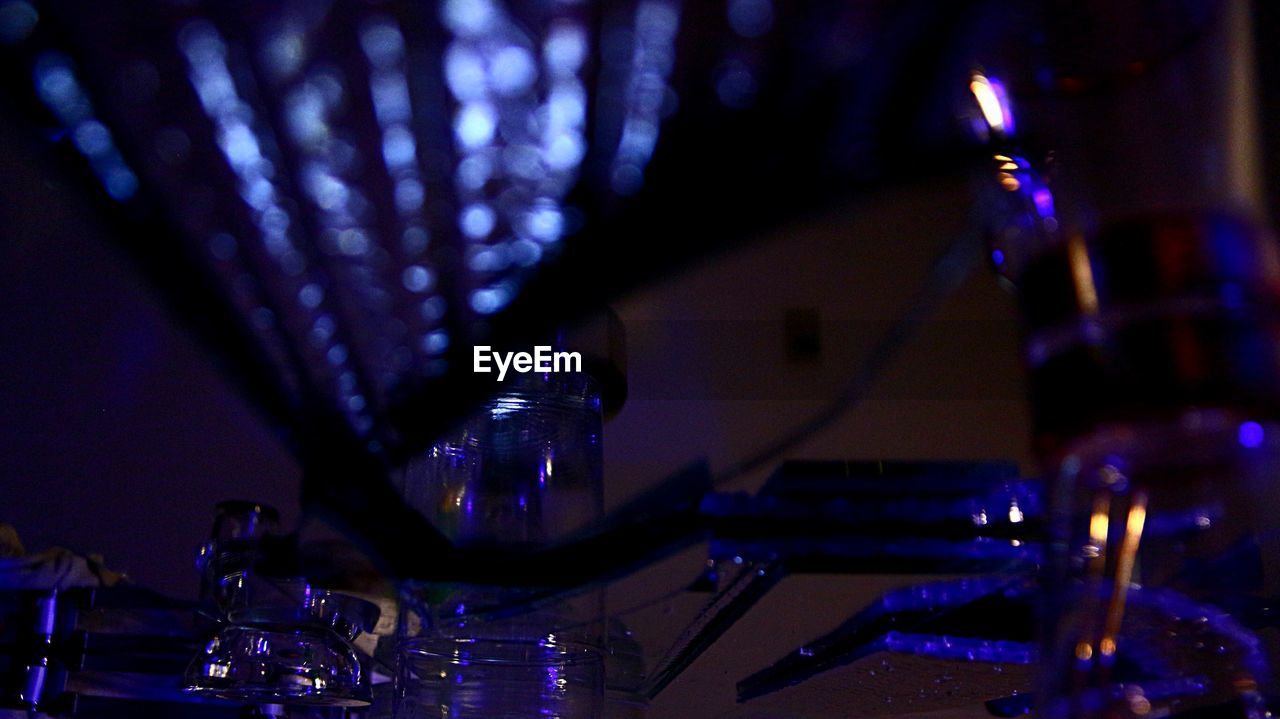 LOW ANGLE VIEW OF LIT LAMP