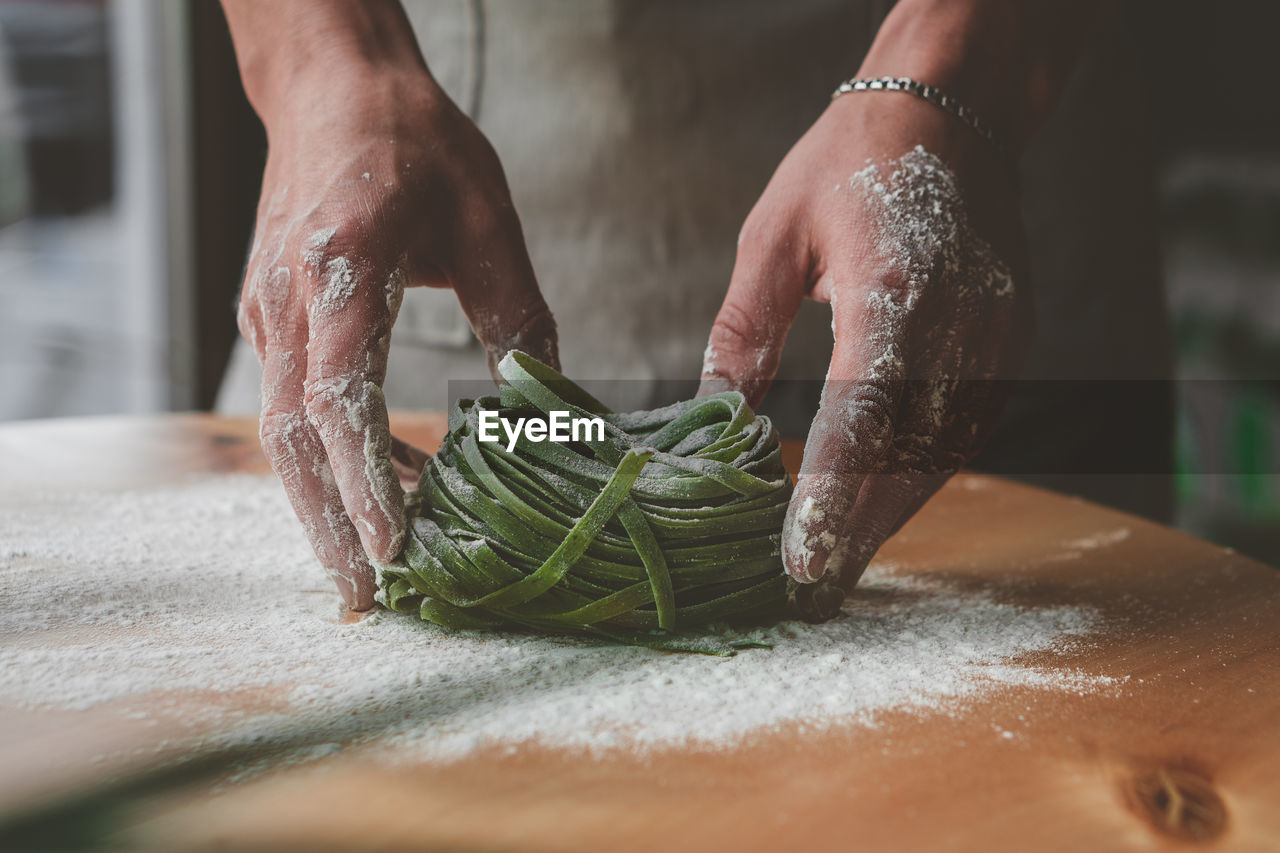 Close-up of person preparing food