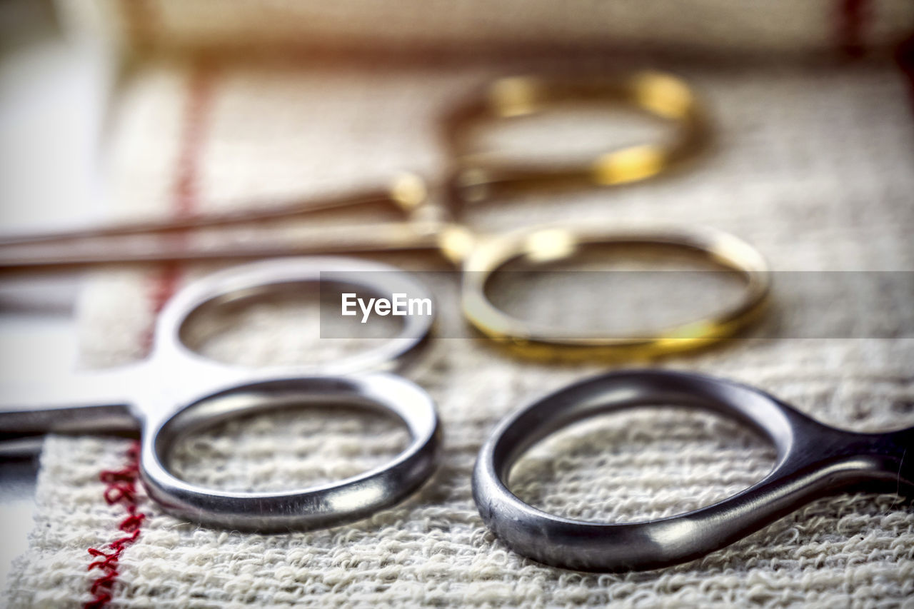 CLOSE-UP OF EYEGLASSES ON TABLE AT CAFE