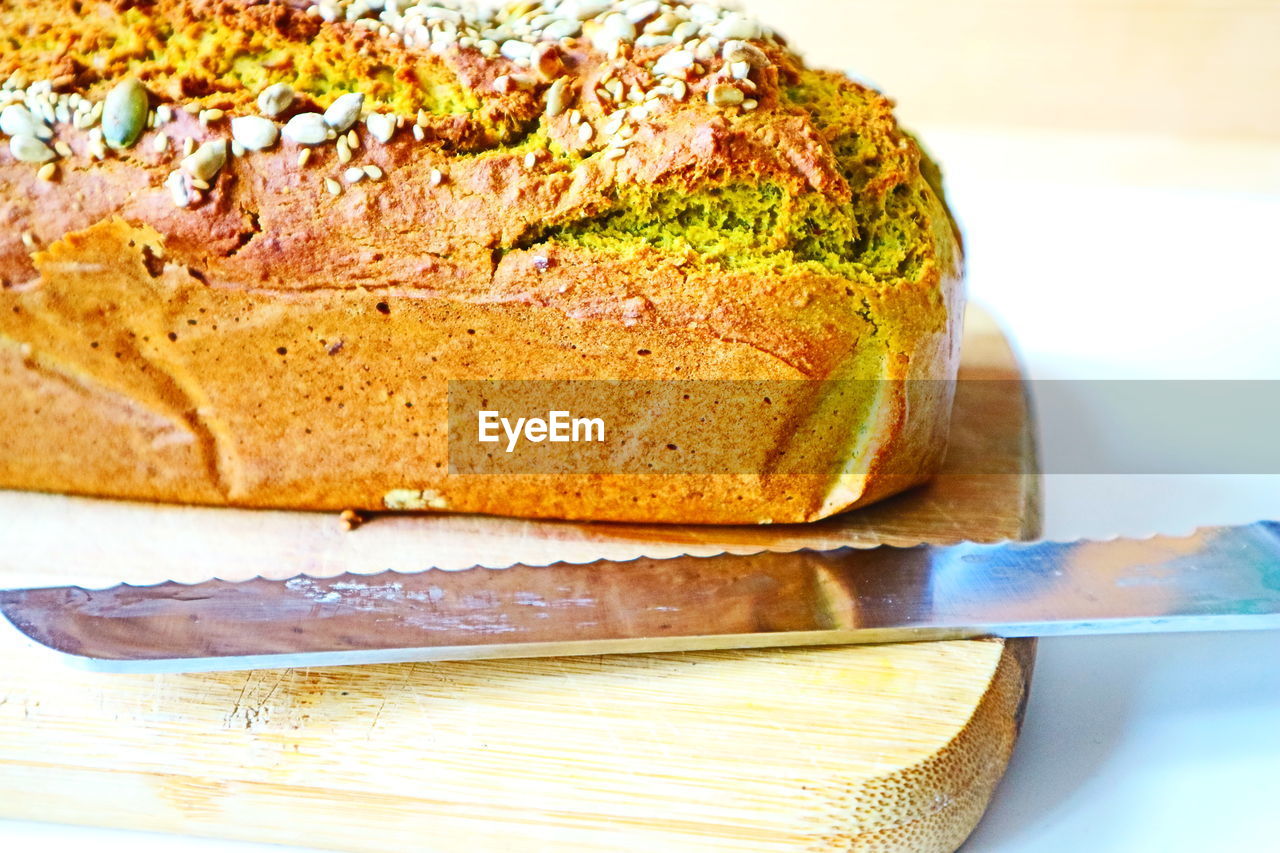 CLOSE-UP OF BREAD ON TABLE