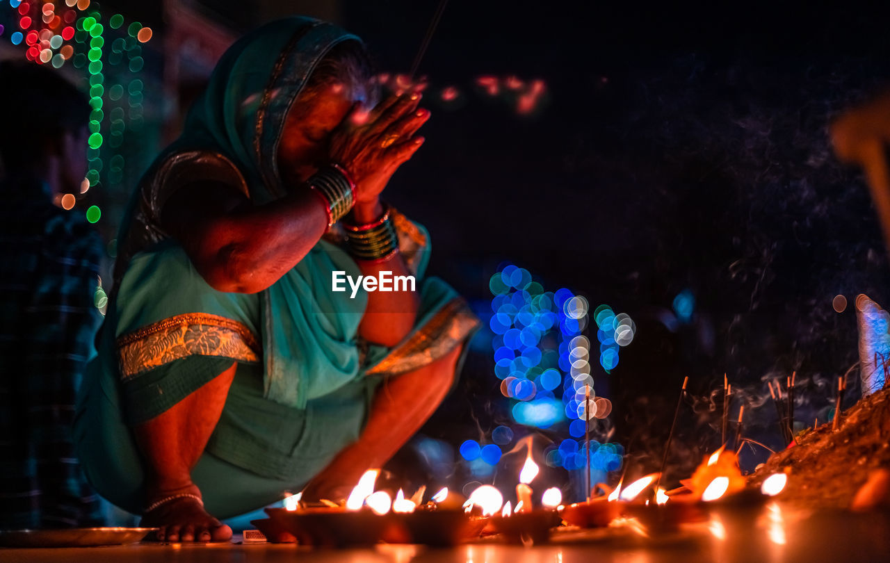 Panoramic view of illuminated lighting equipment at night