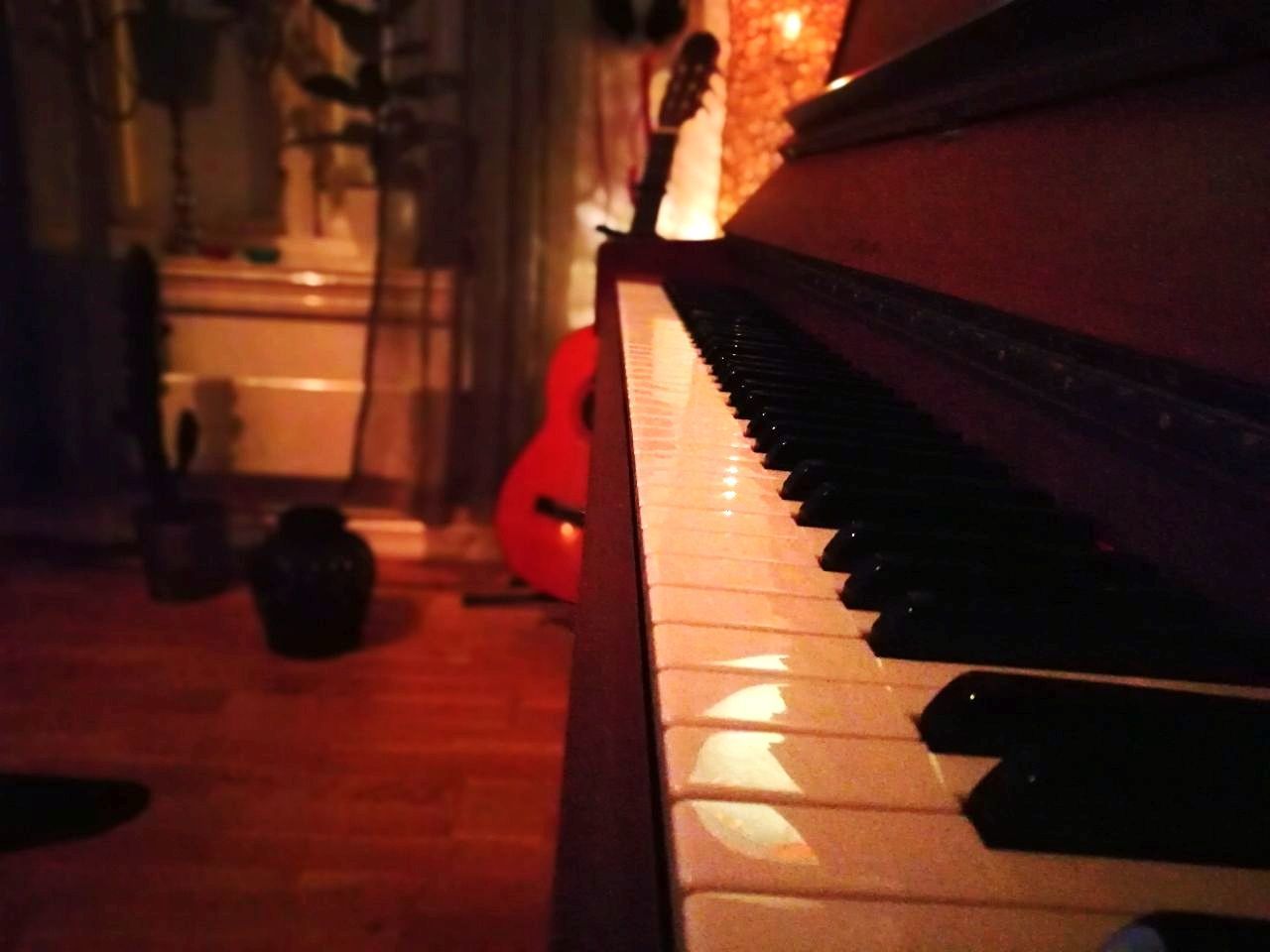 CLOSE-UP OF PIANO KEYS AT NIGHTCLUB