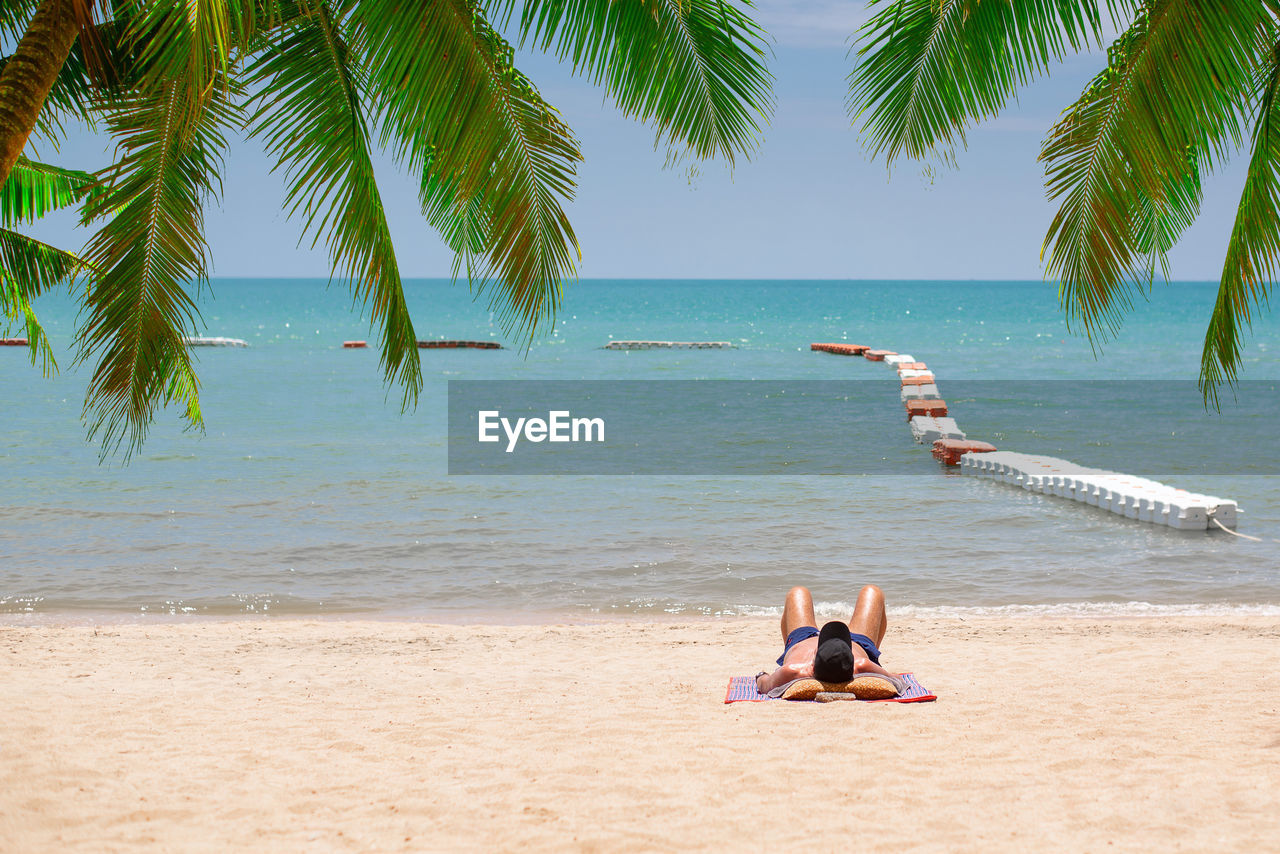 VIEW OF PEOPLE ON BEACH