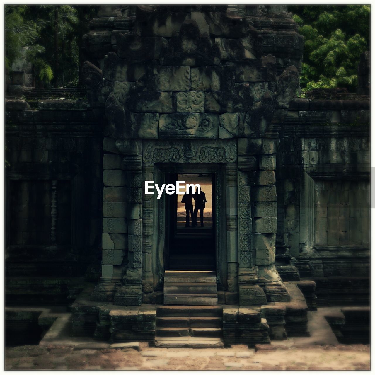 Silhouette people standing in angkor wat