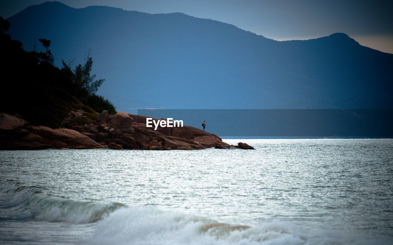 Scenic view of sea against clear sky