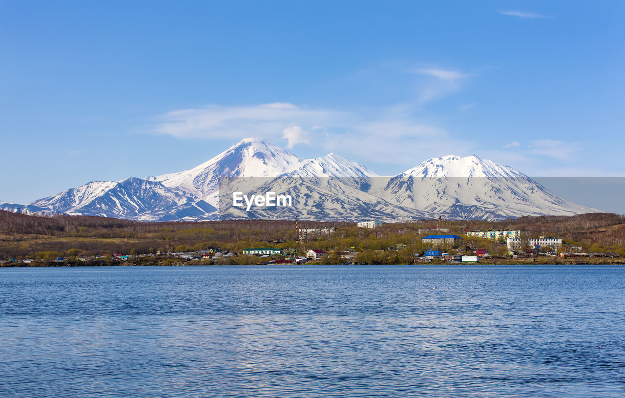 Avachinsky volcano towers over the city of petropavlovsk-kamchatsky. 