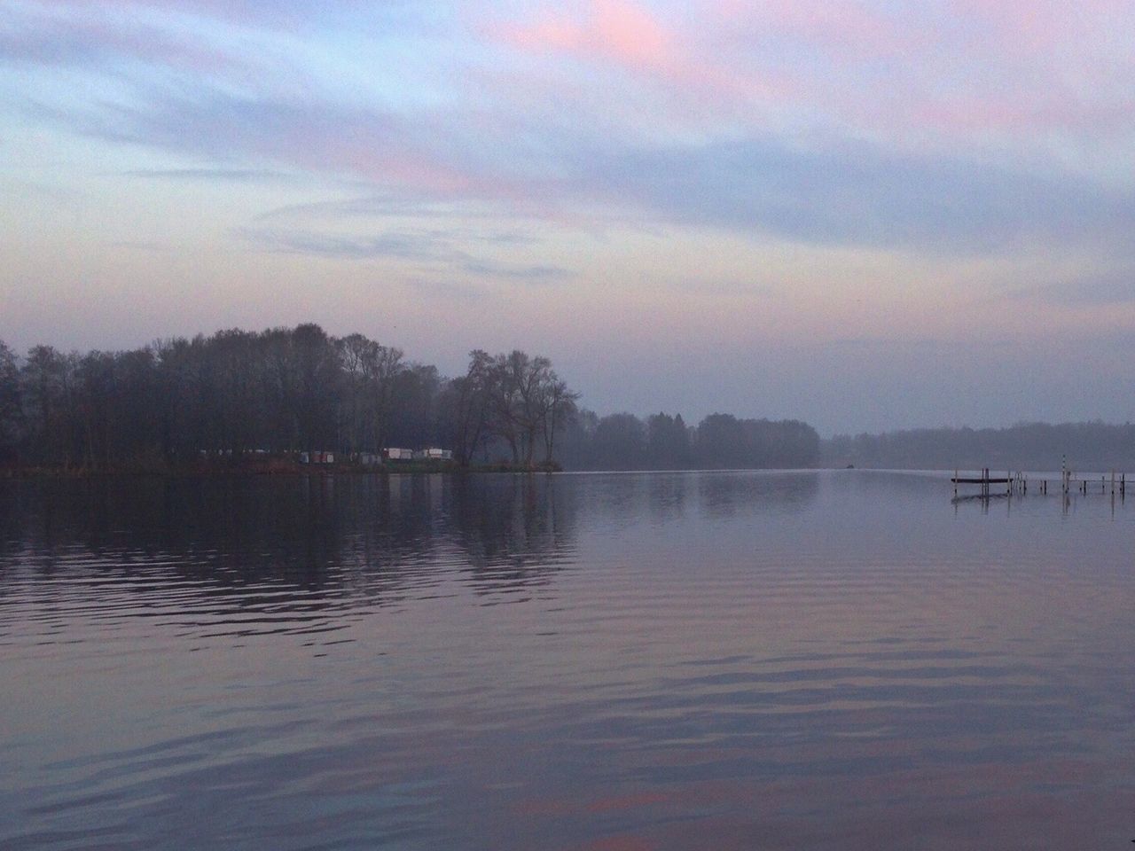 SCENIC VIEW OF LAKE AT SUNSET